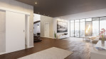 Blick in Wohnmilieu mit Schiebetür Weißlack RAL 9016 Premium in der Wand laufend