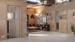 Main-Milieuansicht der vor der Wand laufenden HÖRMANN Schiebetür Pure 2 Nordeiche Duradecor DesignLine mit Lichtausschnitt quer mit bündiger Lisene Steel 80-7