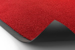 Detailbild mit Ansicht von Ober- und Untermaterial von Fußmatte ColourLine 040 hellrot 85 x 150 cm - Entrada