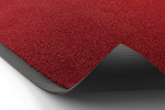 Detailbild mit Ansicht von Ober- und Untermaterial von Fußmatte ColourLine 134 rot 85 x 150 cm - Entrada