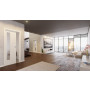 Blick in Wohnmilieu mit Schiebetür Weißlack RAL 9010 Premium LA-02 in der Wand laufend